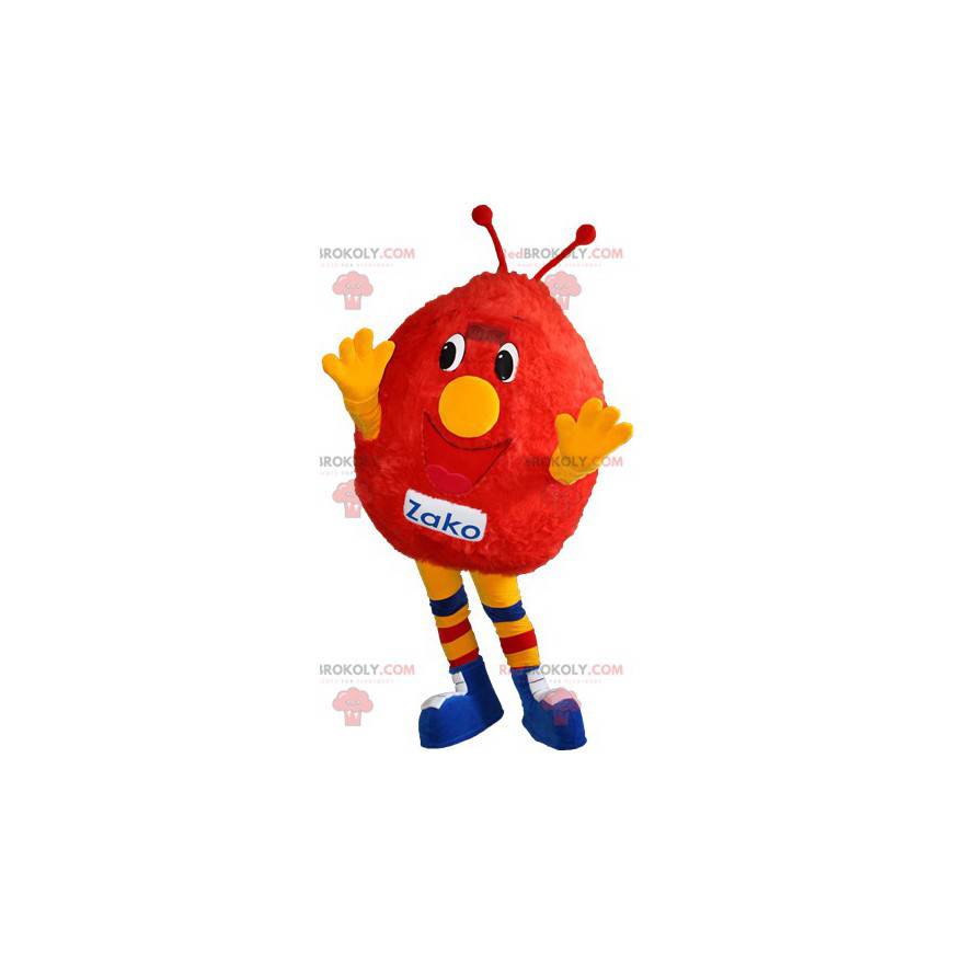 Mascot muñeco de nieve rojo y amarillo. Mascota del monstruo