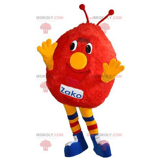 Mascot red and yellow snowman. Red monster mascot -