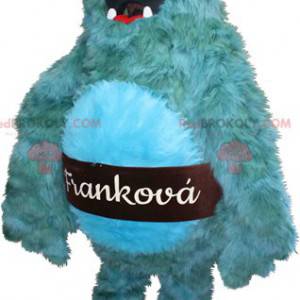 Mascotte mostro blu peloso e divertente. Mascotte Yeti -