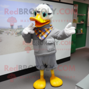 Silver Duck mascot costume character dressed with a Sweater and Eyeglasses