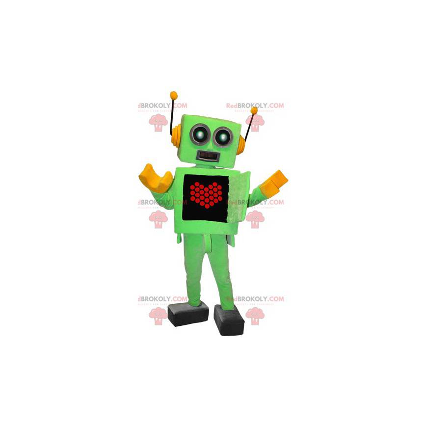 Mascotte robot verde e gialla con un cuore sullo stomaco -