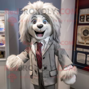 Silver Shepard'S Pie mascot costume character dressed with a Blazer and Hairpins