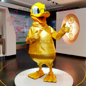 Gold Duck mascot costume character dressed with a Tank Top and Shawl pins