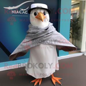 nan Seagull mascot costume character dressed with a Cover-up and Ties