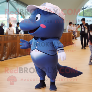 Navy Blue Whale mascot costume character dressed with a Bermuda Shorts and Brooches