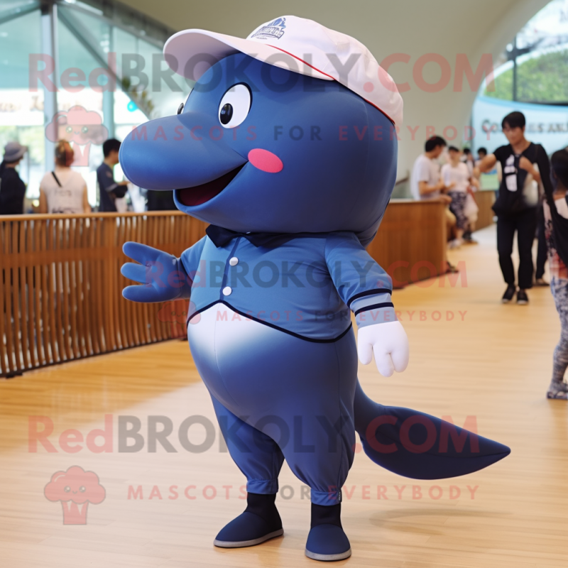 Navy Blue Whale mascot costume character dressed with a Bermuda Shorts and Brooches Navy Blue Whale mascot costume character dressed with a Bermuda Shorts and Brooches