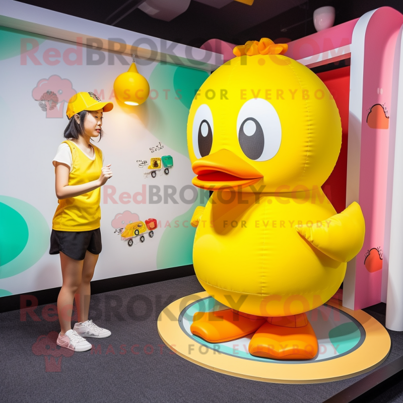 Yellow Duck mascot costume character dressed with a Bikini and Beanies