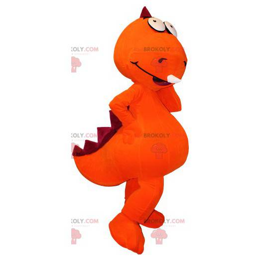Gigantyczna pomarańczowa i czerwona maskotka dinozaura -