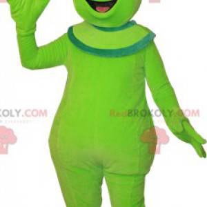 Mascotte aliena aliena verde carina e sorridente -