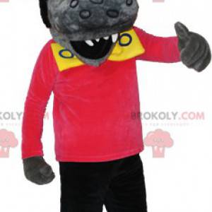 Gray and black wolf mascot with a rock hairstyle -