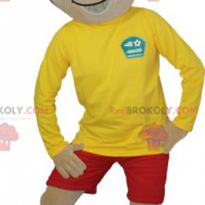 Bruine jongen mascotte in sportkleding - Redbrokoly.com