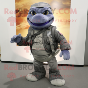 Gray Turtle mascot costume character dressed with a Biker Jacket and Backpacks