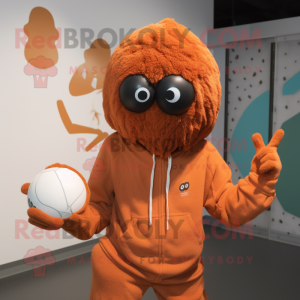 Rust Handball Ball mascot costume character dressed with a Hoodie and Hairpins