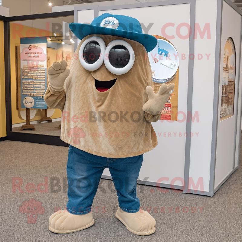 Tan Oyster mascot costume character dressed with a Denim Shorts and Mittens