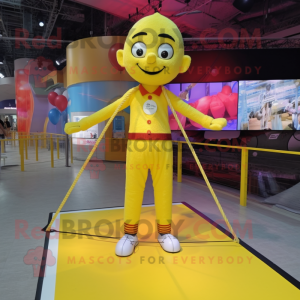 Yellow Tightrope Walker mascot costume character dressed with a Graphic Tee and Keychains