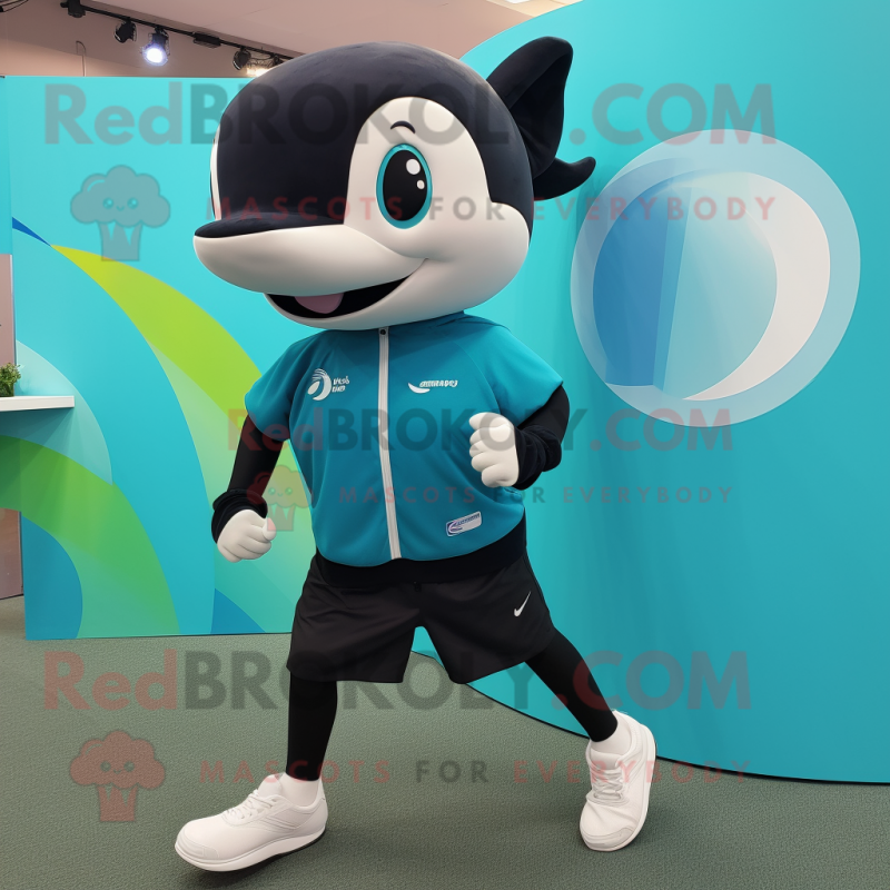 Teal Killer Whale mascot costume character dressed with a Running Shorts and Wallets Teal Killer Whale mascot costume character dressed with a Running Shorts and Wallets