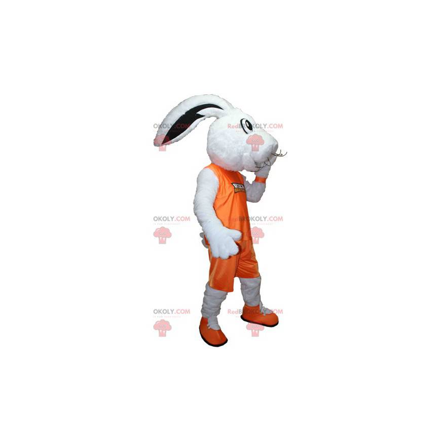 Mascote coelho branco vestido com uma roupa esportiva laranja -