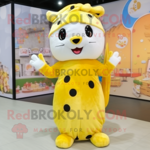 Yellow Ermine mascot costume character dressed with a Blouse and Headbands