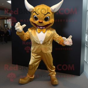 Gold Devil mascot costume character dressed with a Henley Shirt and Bow ties