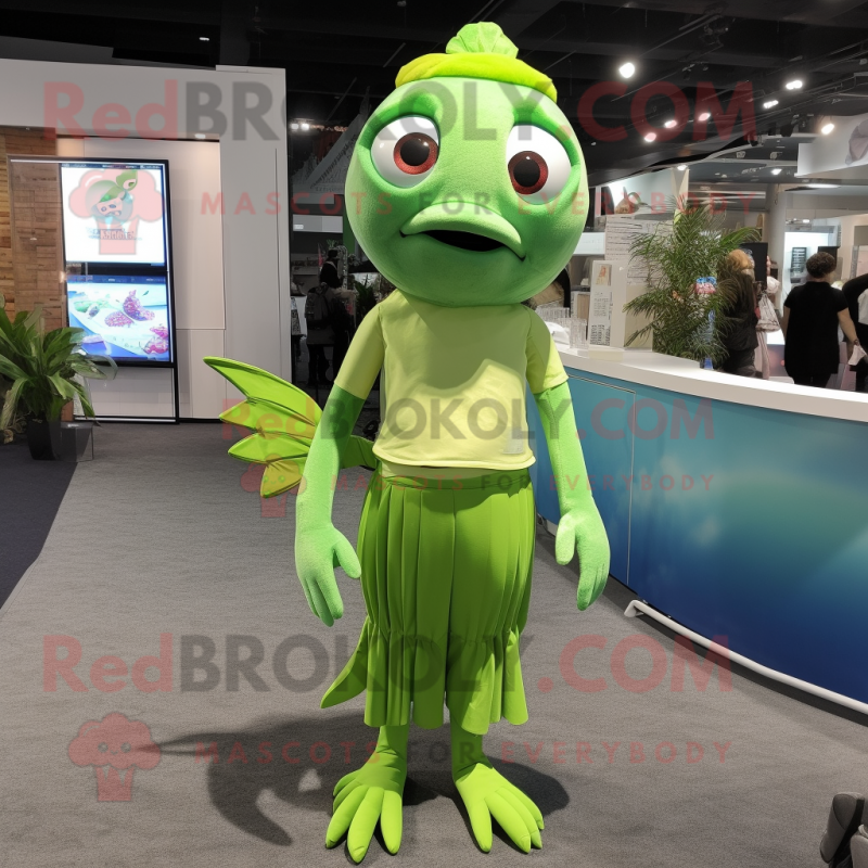 Lime Green Betta Fish mascot costume character dressed with a Culottes and Suspenders Lime Green Betta Fish mascot costume character dressed with a Culottes and Suspenders