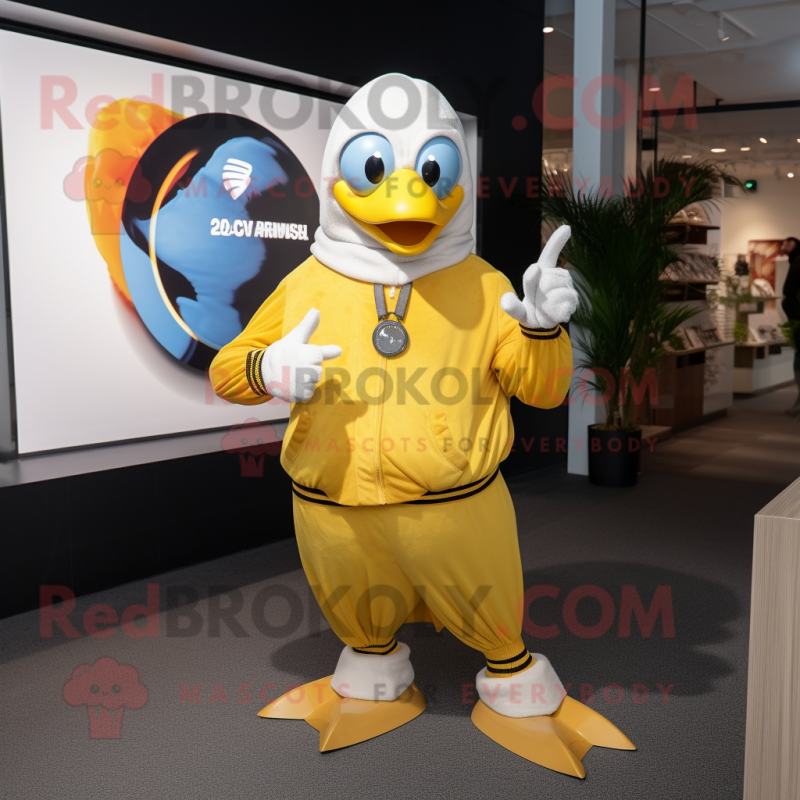 Gold Gull mascot costume character dressed with a Hoodie and Smartwatches Gold Gull mascot costume character dressed with a Hoodie and Smartwatches