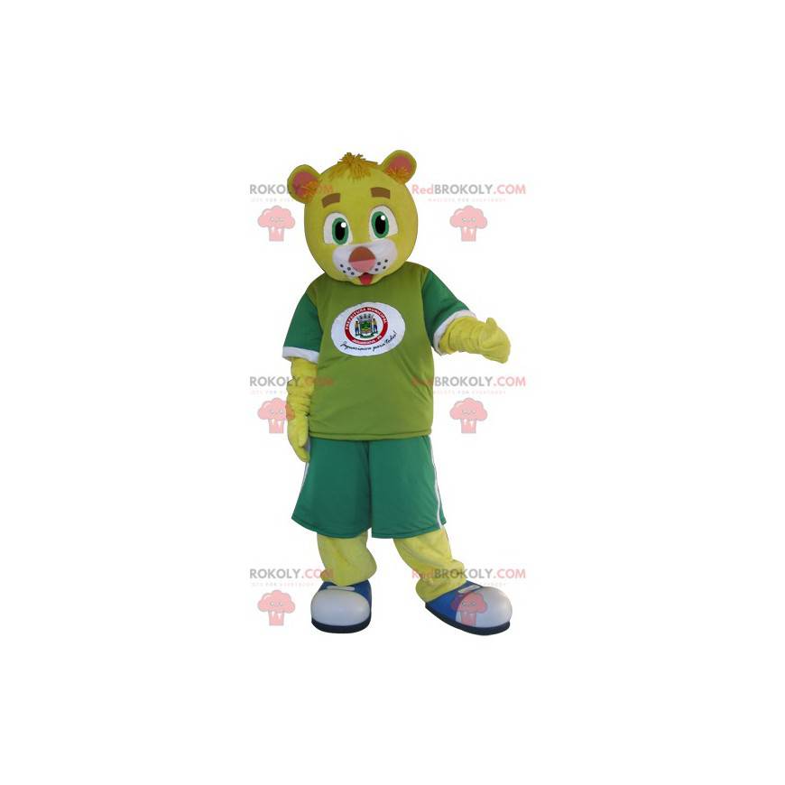 Mascota del oso de peluche amarillo vestida de verde -