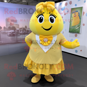 Yellow Potato mascot costume character dressed with a Circle Skirt and Tie pins