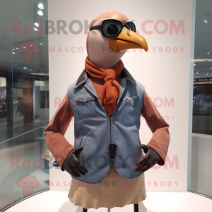 Peach Passenger Pigeon mascot costume character dressed with a Biker Jacket and Tie pins