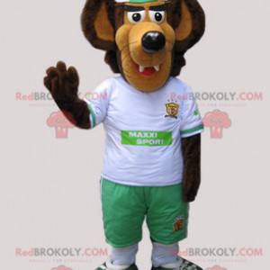 Brown and beige wolf mascot dressed in white and green -