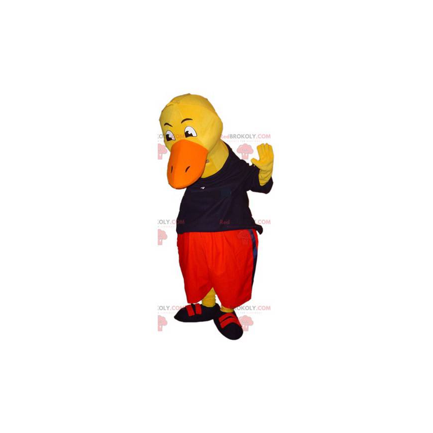 Obří žlutý kachní maskot oblečený v černé a červené barvě -