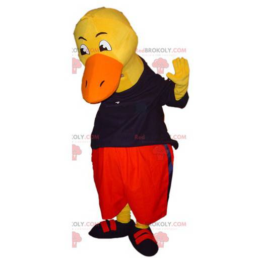 Mascote gigante do pato amarelo vestido de preto e vermelho -