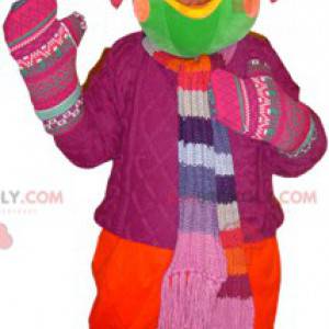 Green bird mascot dressed in winter clothes - Redbrokoly.com