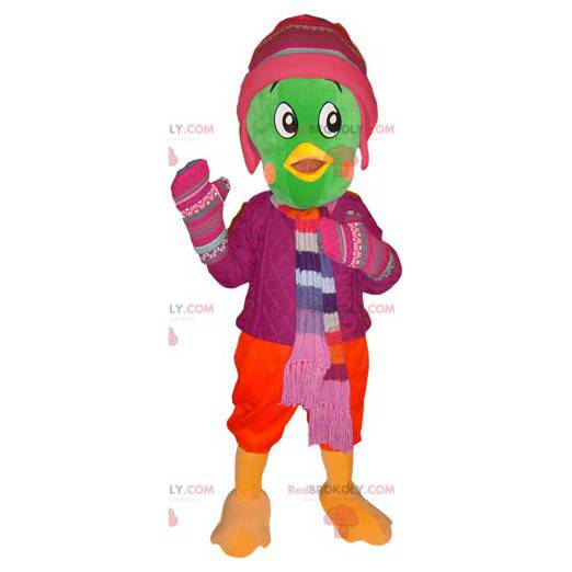 Mascote pássaro verde vestido com roupas de inverno -