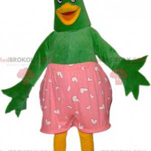 Groene en gele eend vogel mascotte met roze onderbroek -