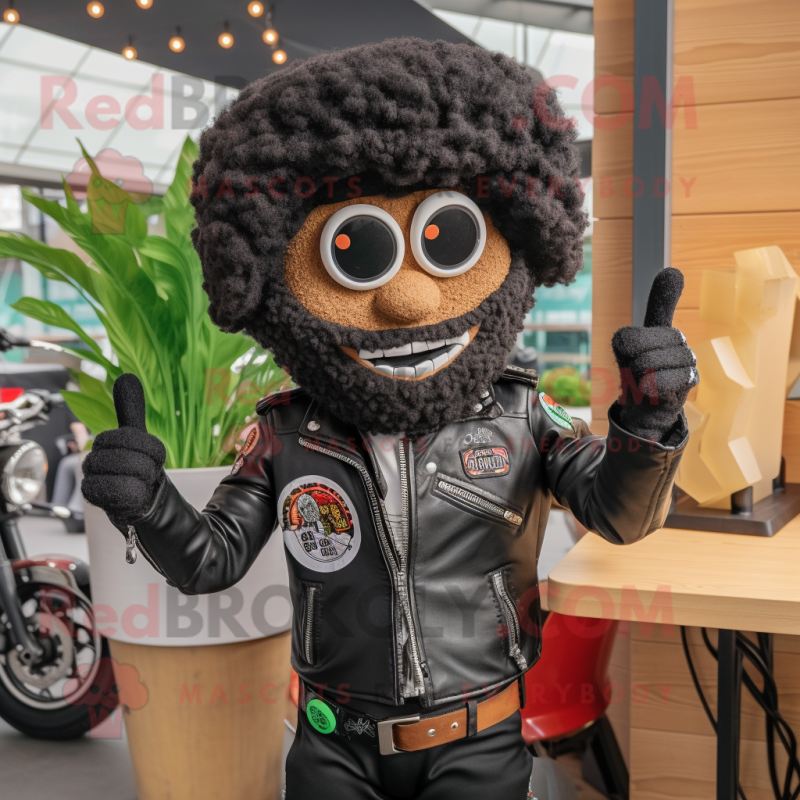 Black Falafel mascot costume character dressed with a Biker Jacket and Brooches Black Falafel mascot costume character dressed with a Biker Jacket and Brooches