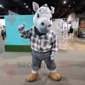 Silver Rhinoceros mascot costume character dressed with a Flannel Shirt and Shoe laces