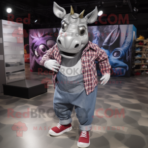 Silver Rhinoceros mascot costume character dressed with a Flannel Shirt and Shoe laces
