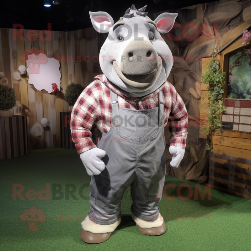 Silver Rhinoceros mascot costume character dressed with a Flannel Shirt and Shoe laces