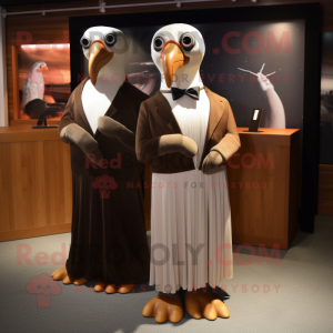 Brown Albatross mascot costume character dressed with a Evening Gown and Ties