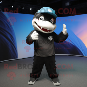 Black Barracuda mascot costume character dressed with a Polo Tee and Beanies