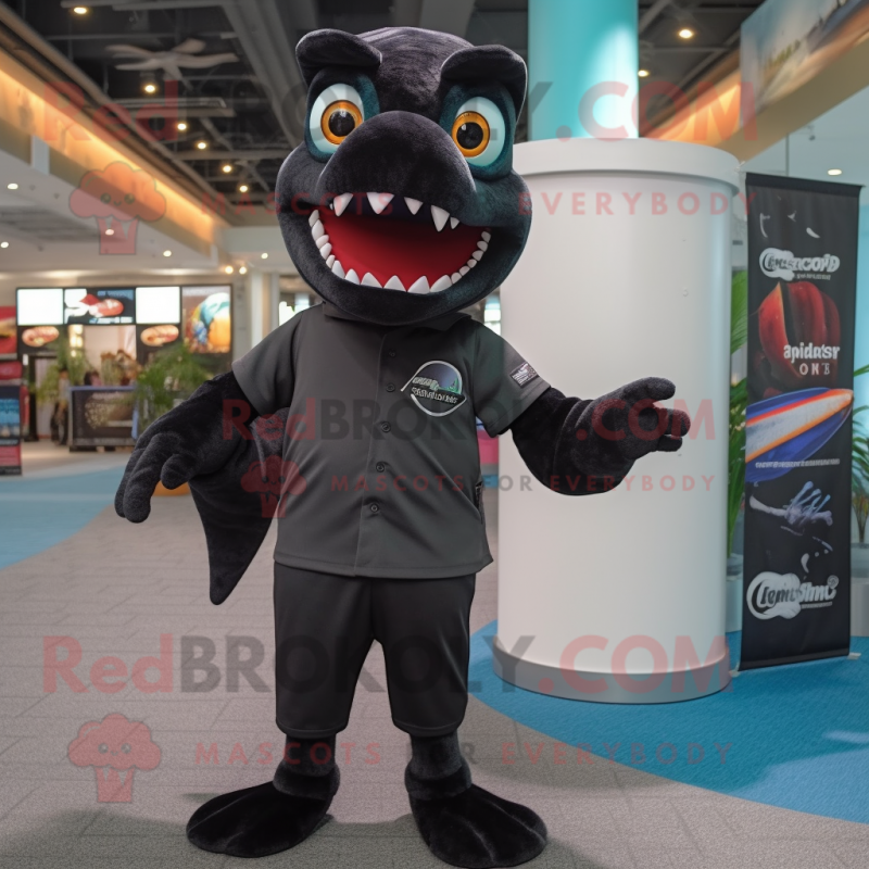 Black Barracuda mascot costume character dressed with a Polo Tee and Beanies