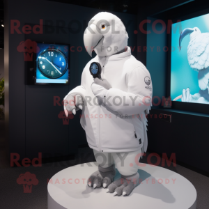 White Parrot mascot costume character dressed with a Sweatshirt and Smartwatches