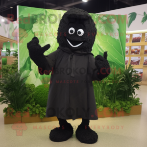 Black Spinach mascot costume character dressed with a Cardigan and Foot pads