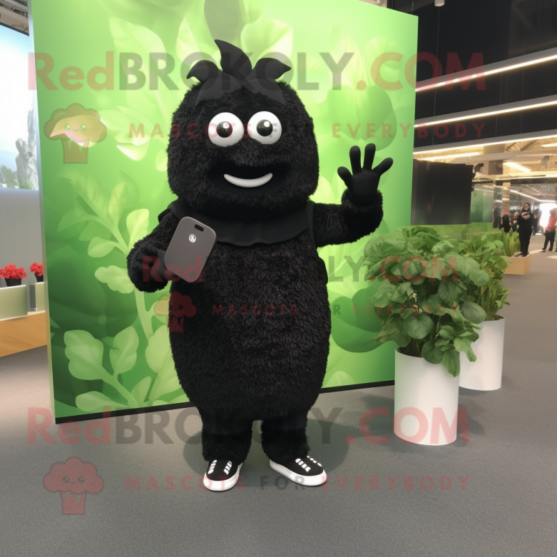 Black Spinach mascot costume character dressed with a Cardigan and Foot pads