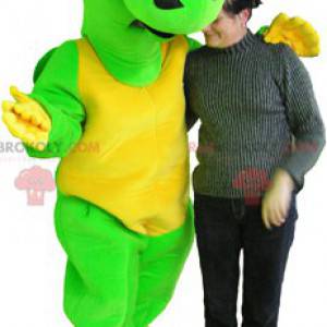 Mascotte drago gigante e divertente verde e giallo -