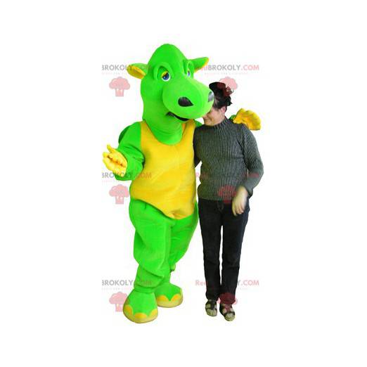 Reusachtige en grappige groene en gele draakmascotte -