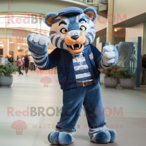 Navy Saber-Toothed Tiger mascot costume character dressed with a Denim Shirt and Mittens