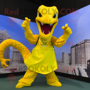 Yellow Hydra mascot costume character dressed with a Blouse and Gloves
