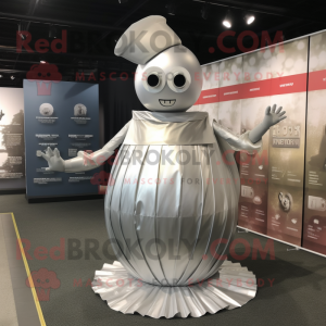 Silver Human Cannon Ball mascot costume character dressed with a Empire Waist Dress and Wraps