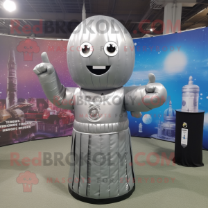 Silver Human Cannon Ball mascot costume character dressed with a Empire Waist Dress and Wraps